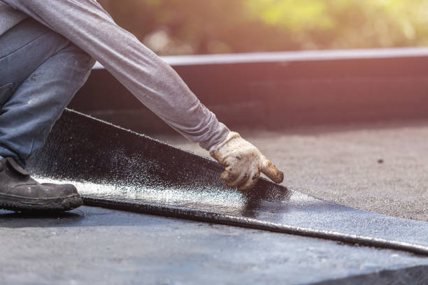 Professional Basement Waterproofing technician working in Le Roy, IL